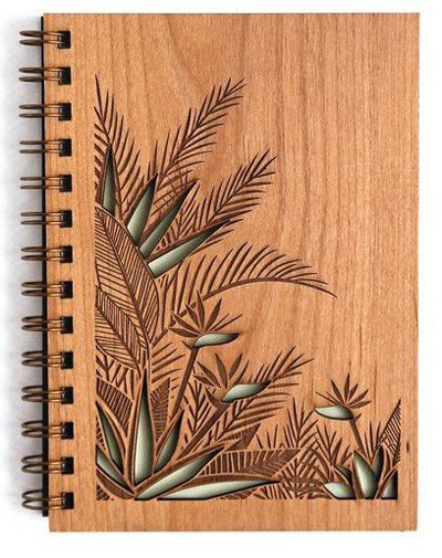 laser cutting a book cover decoration